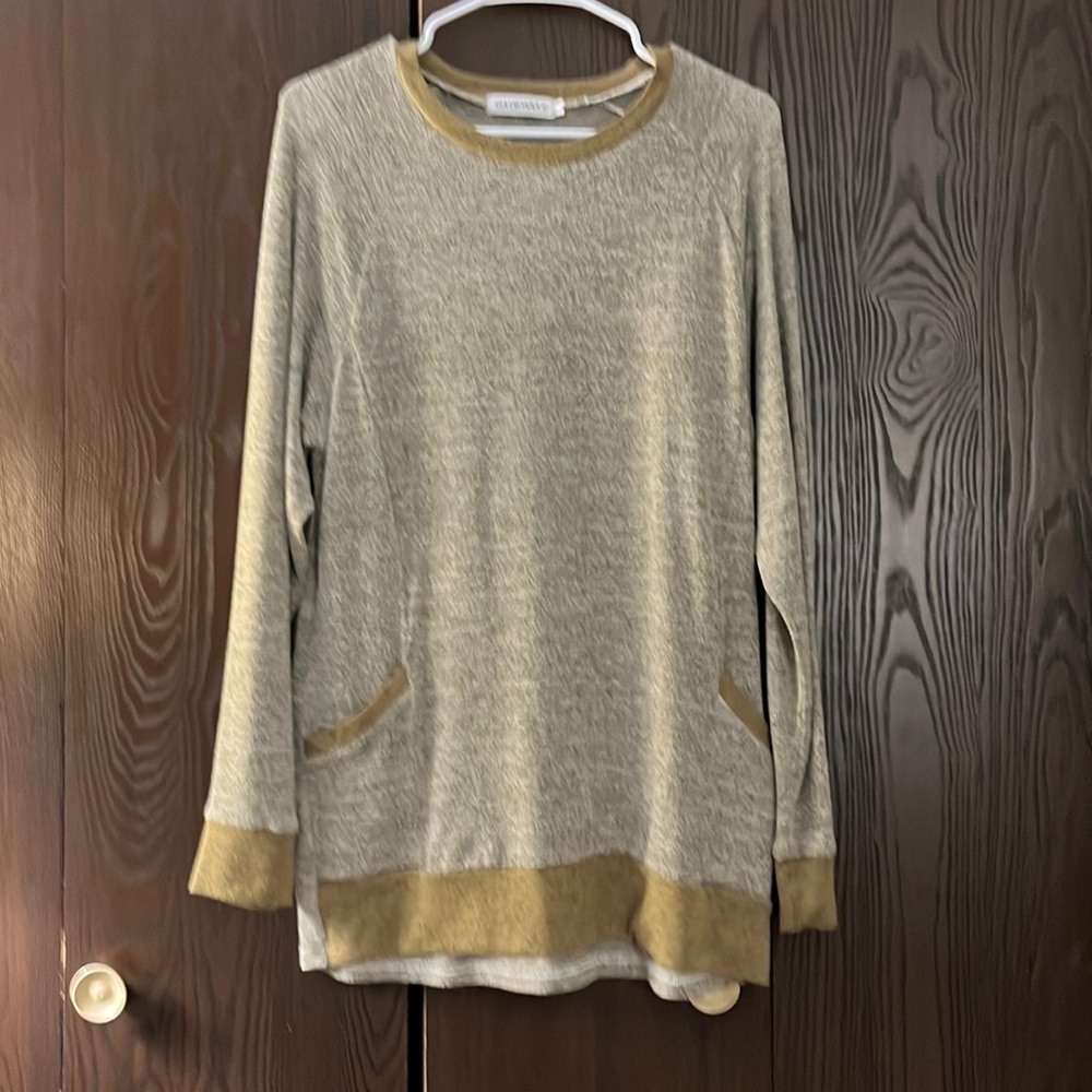 Gadewake light brown with gold trimmed sweater. Size Medium.